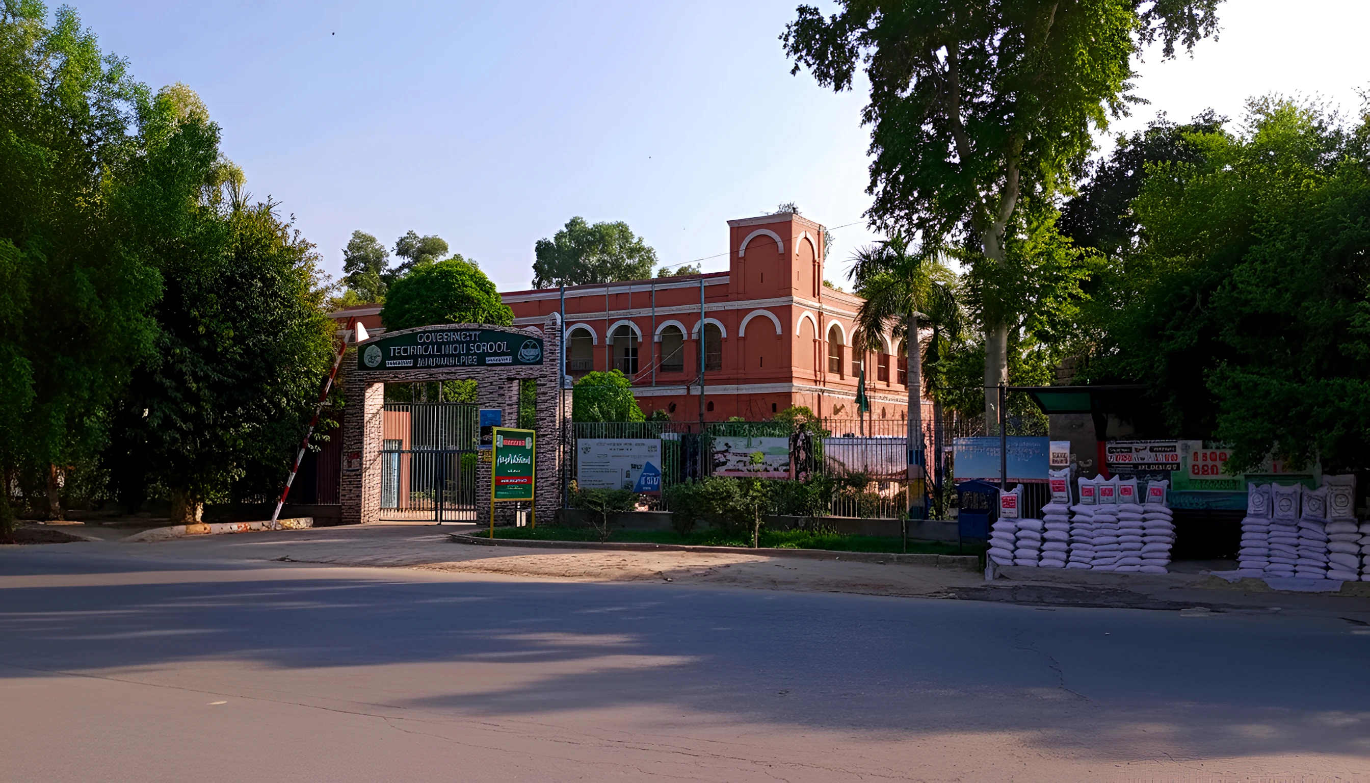 Technical High School Bahawalpur - Historic red brick building with architectural domes